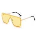 Occhiali da sole shield oversize con lenti giallo brillante e aste in metallo dorato - Giallo