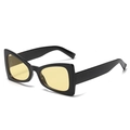 Occhiali da sole cat-eye neri con lenti color ambra e un discreto logo d sulla lente - Cornice Nera Lente Gialla