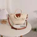 Borsa a tracolla intrecciata color crema con patta in pelle marrone e perla - Stile con Patta in Perla Traforata / Bianco Sporco