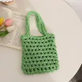 Handmade green woven cotton rope handbag with hollow mesh texture for summer beach style - Green