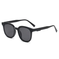 Hip hop style oval sunglasses with glossy black frame and dark grey lenses in a sleek design - Bright Black