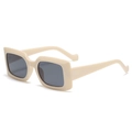 Retro cream-colored rectangular sunglasses with thick frames and dark UV-protective lenses - Beige