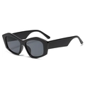 Occhiali da sole retrò neri con montatura geometrica spessa e lenti grigio scuro - Nero Lucido