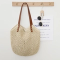 Handwoven straw tote bag with brown leather straps in a natural beige vintage style - Beige