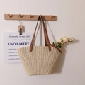 Straw tote bag with brown leather handles and wavy edge detail for beach vacation - Beige