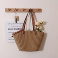 Minimalist straw woven tote bag in light brown featuring long brown leather handles - Coffee