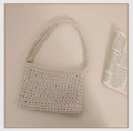 Minimalist beige hand-woven cotton shoulder bag with elegant honeycomb texture - Beige