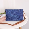Dark blue woven corn husk straw crossbody bag with adjustable brown leather strap - Blue