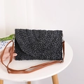 Handmade black woven straw envelope bag with a brown leather shoulder strap - Black