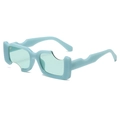 Irregular light blue sunglasses with light green transparent lenses and cut-out frame - Blue