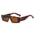 Detail view of stylish square tortoiseshell sunglasses with brown lenses and wide temples - Tortoise