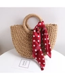Close-up of semi-circle straw bag with red polka dot scarf on a minimalist background - Coffee + Red Polka Dot Scarf