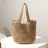 Handcrafted woven straw tote bag in light brown for summer beach travel and vacation - Brown