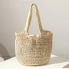 Beige straw woven tote bag with circular U-shaped design for summer beach vacation - Off White