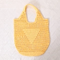 Vibrant yellow hollow straw tote bag with a geometric triangle pattern and single handle - Inverted Triangle Hollow / Yellow