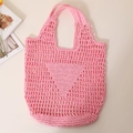 Pink straw woven tote bag featuring a hollow mesh design and triangle knit pattern - Pink