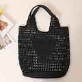 Minimalist black crochet woven tote bag with hollow knit triangle pattern on cream surface - Black