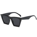 Occhiali da sole retrò cat-eye con montatura nera lucida e lenti grigio scuro - Nero Lucido
