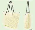 Detail view of large crochet straw tote bag showing both front and side perspectives - White