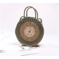 Handmade circular woven straw bag with green and brown contrast tones for beach vacation - Round Green + Camel