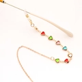 Detail of gold chain with colorful heart crystals and adjustable silicone eyeglass loops - Multicolor Gold