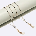 Handgemaakte gouden zonnebrilketting met zwarte driehoeken en kristallen kralen - Gouden Zwart-Wit Driehoekige Kristallen Ketting (GL1639)