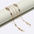 Golden anti-slip eyewear chain with hollow leaf charms and silicone loops for glasses - Gold
