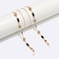 Catena per occhiali dorata con perle quadrate nere e sfere di strass su base bianca - Oro con quadrati neri e sfera di strass