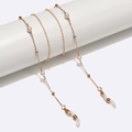 Catena per occhiali in metallo dorato con eleganti perle bianche e terminali regolabili - Oro