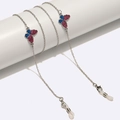 Catenina per occhiali argento con farfalle glitterate su supporto cilindrico - Stile Argento con Ciondolo a Farfalla (GL1580)