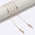 Gold eyewear chain with white pearls and black rhinestone rings for glasses or masks - Gold Pearl Black Rhinestone Style (GL1562)