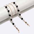 8mm black and white pearl eyewear chain with gold lobster clasps and silicone loops - Gold Chain with Black and White Pearls