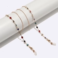 Golden eyewear chain featuring colorful rhinestones on a white display stand - Gold (Multicolor Rhinestone)