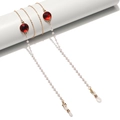 Elegante catenella per occhiali dorata con perle bianche e cristalli rossi lucidi - Rosso