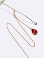 Golden metal eyewear chain featuring elegant red teardrop gemstone pendants for glasses - Red