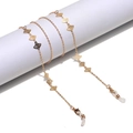 Golden fan-shaped hollow glasses chain with metal lobster clasps and silicone rings - Gold