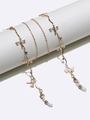 Elegante cadena de gafas de libélula dorada con diamantes de imitación y bucles de silicona - Estilo Libélula Dorada con Diamantes de Imitación