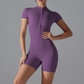 Close-up of deep purple yoga bodysuit featuring a stand collar and seamless front zipper - S / Purple Thistle