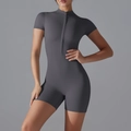 Macro detail of dark grey yoga romper with short sleeves and front zipper closure - S / Graphite Grey