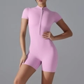 Detailed view of pink zipper short sleeve yoga romper with high-stretch fabric and slim fit - S / Sakura Pink
