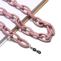 Pink acrylic thick chain link eyeglass holder and face mask lanyard on book - Purple