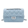 Light blue quilted denim crossbody bag with silver chain strap and classic diamond stitching - Light Blue