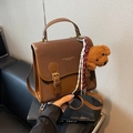 Brauner Vintage-Rucksack aus Leder mit Teddybär-Anhänger und modischem Logo - Mit Anhänger / Kaffeebraun