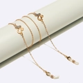 Catena per occhiali dorata con ciondoli a farfalla e cuore impreziositi da strass lucidi - Oro