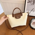 Elegant cream oxford nylon tote bag with brown textured leather trim and top handles - Off White