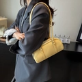 Chic yellow lychee leather cylinder shoulder bag for women with silver hardware - Yellow