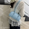 Light blue Boston shoulder bag with lychee texture leather and silver metal hardware - Blue