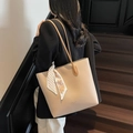 Minimalist beige tote bag for women featuring a decorative silk scarf on the shoulder strap - Khaki