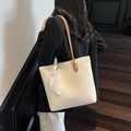 Minimalist beige leather tote bag with brown straps and decorative silk scarf detail - Off White