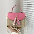 Straw handbag with pink faux leather panels and woven tassel detail on a cotton strap - Pink